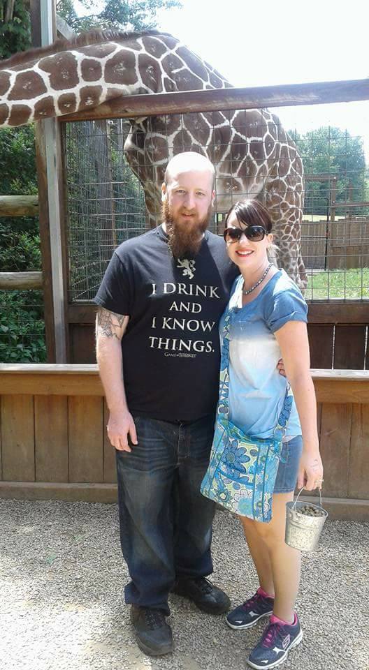 Picture L.A. Detwiler giraffe and husband
